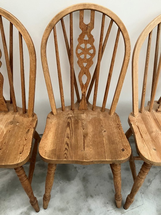 Image 1 of Ensemble de 4 chaises de salle à manger vintage Ercol à dossier à roulettes, années 1950