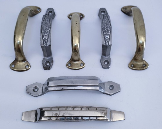 Image 1 of sette maniglie Art Déco in argento e ottone