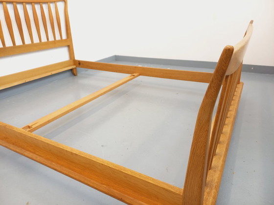 Image 1 of Vintage French double bed by Guillerme et Chambron in solid oak from the 1960s
