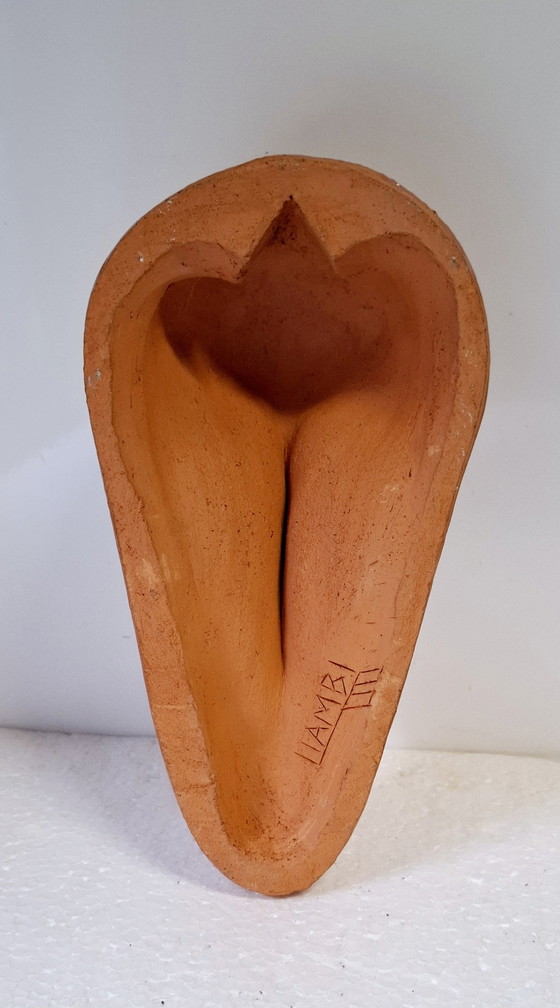 Image 1 of Masque africain en céramique .