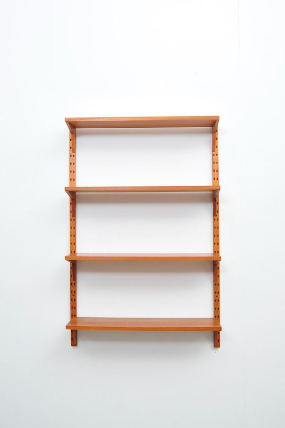 Image 1 of "Royal System" wall shelf made of teak by Poul Cadovius for CADO (1950s)