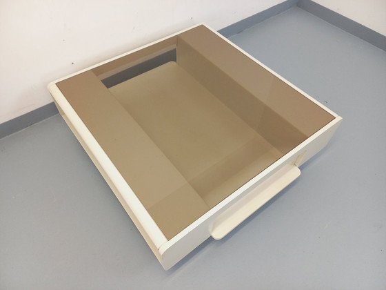 Image 1 of Vintage square coffee table in Space Age style, made of white wood and smoked glass, from the 1970s