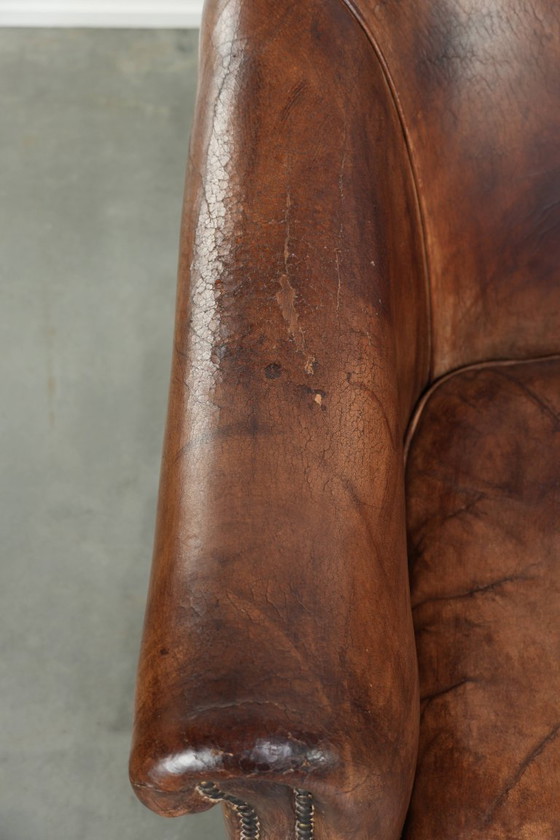 Image 1 of 2 fauteuils club vintage en peau de mouton, au look superbe et à l'assise confortable.