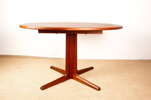 Extendable Danish teak dining table with central pedestal, by Niels Moller 1960.