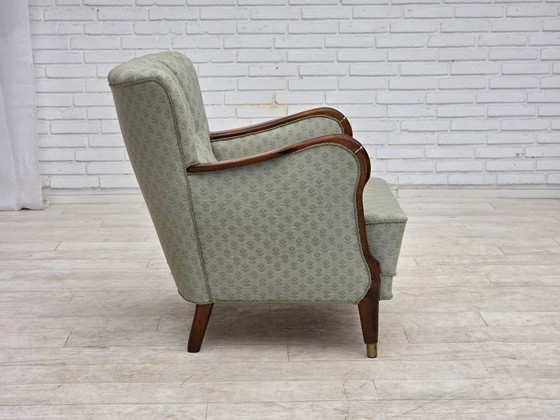 Image 1 of Deense fauteuil uit de jaren 60, lichtblauwe meubelstof, beukenhout.