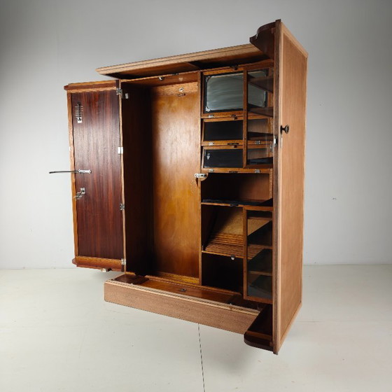 Image 1 of Men's wardrobe from the 1920s by Compactom Ltd in light oak.