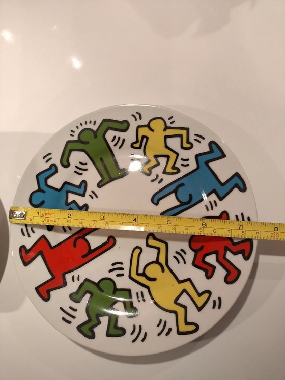 Image 1 of Keith Haring Dinnerware: 3 different sized plates, 1 coffee cup and saucer.