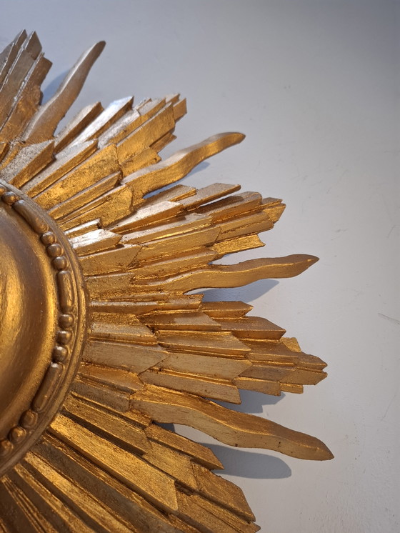 Image 1 of 46cm sun mirror in rare wood, 1950s version. Gold color.