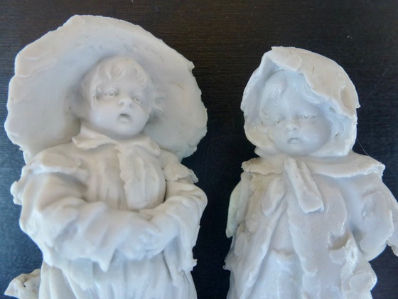 Image 1 of Luxury sponge porcelain figurine with gold leaf finish.