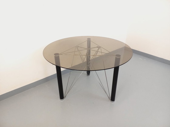 Image 1 of Vintage round dining table in smoked glass, black metal and chrome metal from the 80s