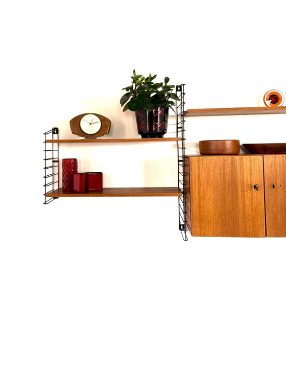Sistema a parete modulare vintage in teak, Musterring ‘60 – Armadi a muro, Legno, Metallo (photo 2 of 14)