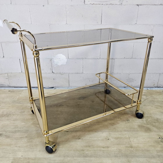 Vintage golden brass bar cart / trolley smoked glass shelves (photo 3 of 15)