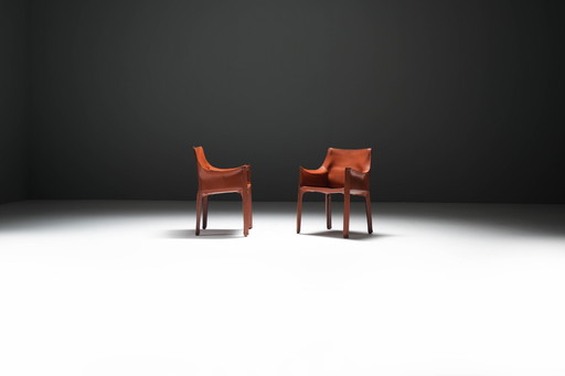 Early & matching Cab 413 Armchairs (2) in leather by Mario Bellini for Cassina.