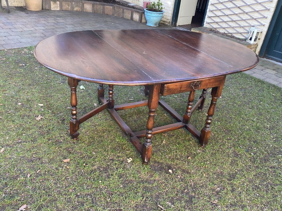 Image 1 of Antique English gateleg table, solid wood, oval, extendable