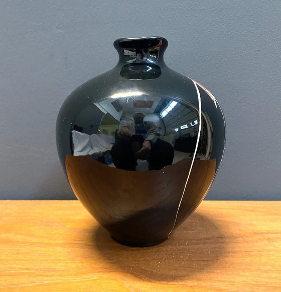 Image 1 of Vaas van Georg Schmider Zell, model 4089, zwart met kleurrijk bladpatroon.