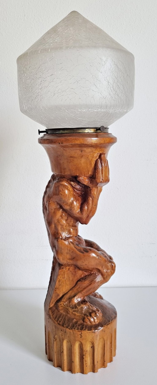 Folk art wooden sculpture lamp with crackled glass