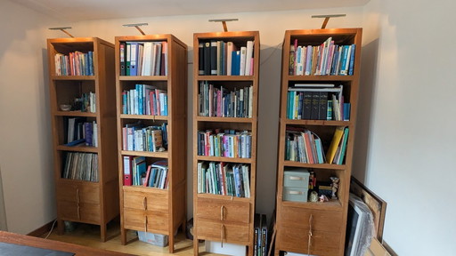 Set van 4 teakhouten boekenkasten + verlichting