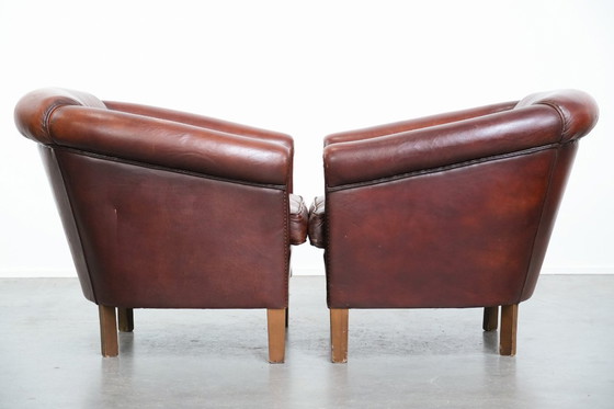 Image 1 of 2 x Vintage schapenleren clubfauteuil met siernagels 