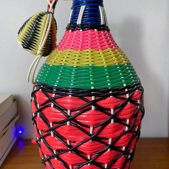 Image 1 of Vintage glass bottle and plastic braided scoubidou