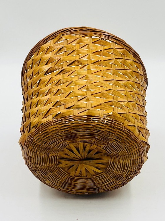 Image 1 of Cache pot vintage en osier tressé