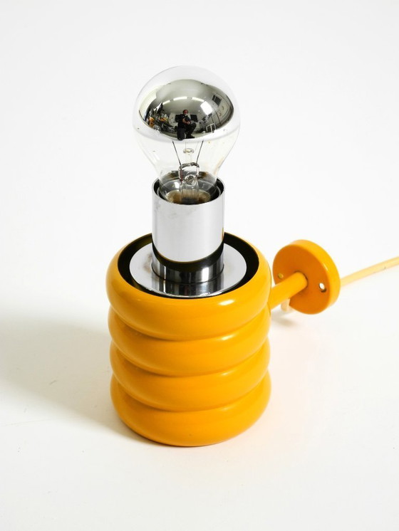 Image 1 of Very rare original 1960s Space Age "Bulb" wall lamp by Ingo Maurer in yellow with a clear glass shade