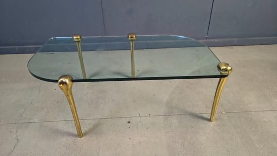Image 1 of Salontafel van messing en glas, jaren 70.