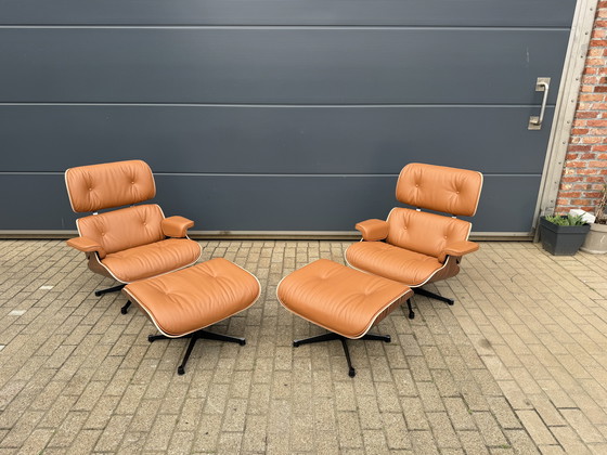 Image 1 of 2 poltrone lounge Vitra Eames XL originali con poggiapiedi, in pregiata pelle color cognac e palissandro Santos, NUOVE!!