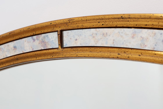 Image 1 of Mirror by Deknudt with marbled fume glass side panels in gilded wooden frame