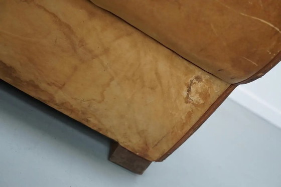 Image 1 of Ein Paar französischer cognacfarbener Ledersessel mit schnurrbartförmigen Rückenlehnen, 1940er Jahre