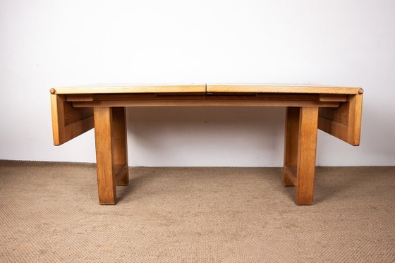 Image 1 of Gran mesa de comedor extensible de roble macizo, diseñada por Guillermo y Chambron en 1960.