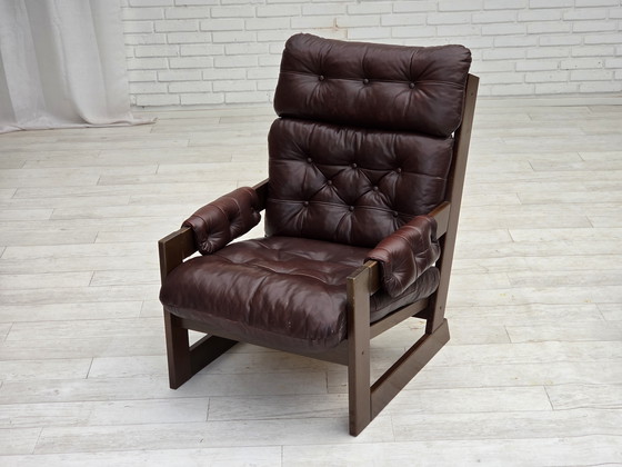 Image 1 of 1970, Scandinavische fauteuil met hoge rugleuning, bruin meubelleder, donker beukenhout.
