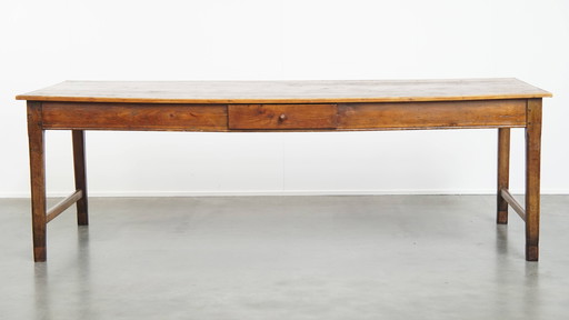 Grande table de salle à manger antique avec un tiroir