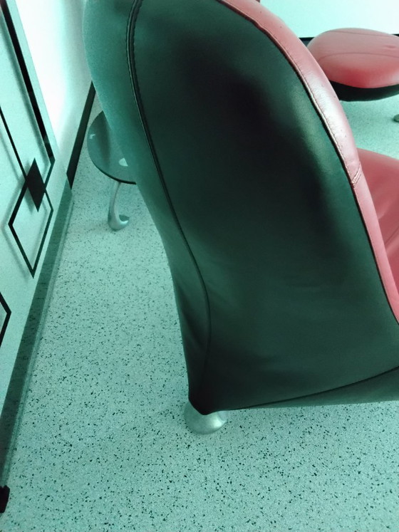 Image 1 of Set of Leolux Chi chairs with side table, footstool, and cushion.