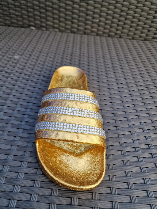 La pantoufle d'or / Bling