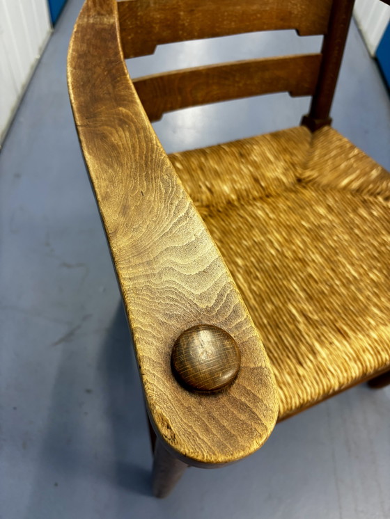 Image 1 of Antieke houten stoel met origineel strovlechtwerk.