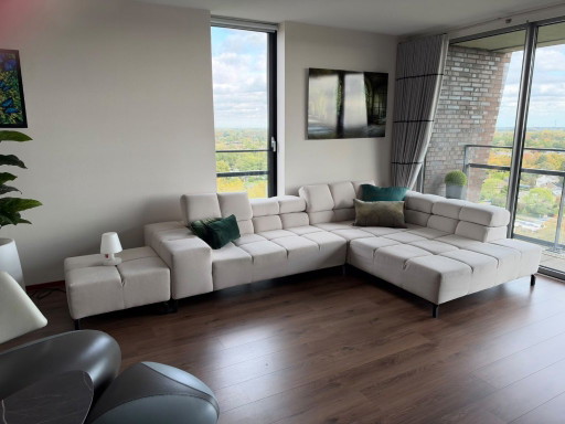 Modular corner sofa with ottoman/footstool, beige/cream color