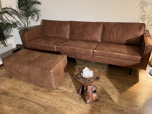 Leather sofa with pouffe