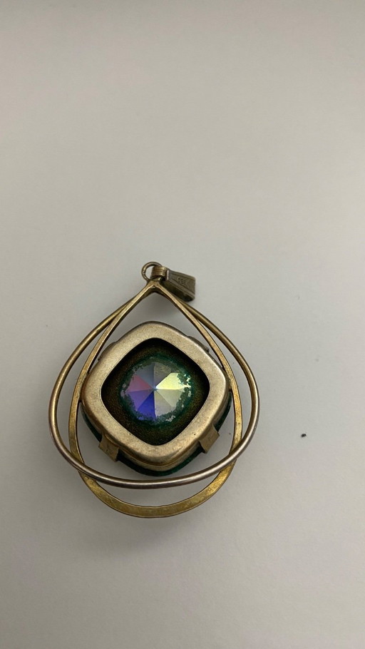 Pendentif en argent 830 avec une grosse pierre à facettes