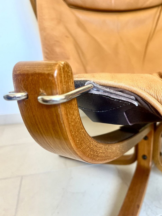 Image 1 of Vintage Falcon fauteuil (hoge rugleuning) en poef – Sigurd Resell, Vatne Møbler (jaren 70)