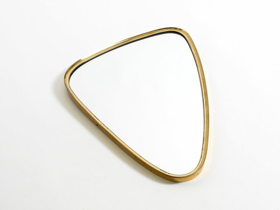 Image 1 of Beautiful heavy mid-century brass kidney-shaped wall mirror from Münchner Zierspiegel