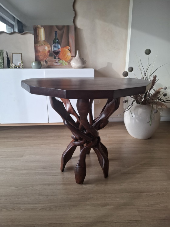 Image 1 of Interlocking African "unity" table.