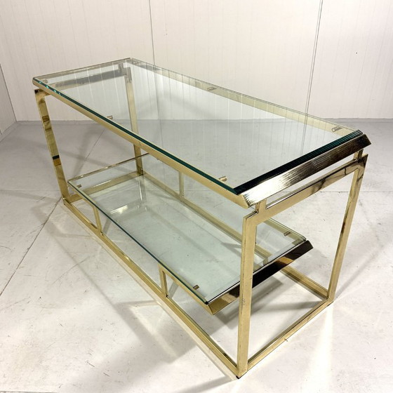 Image 1 of Mesa consola de latón y cristal, años 70