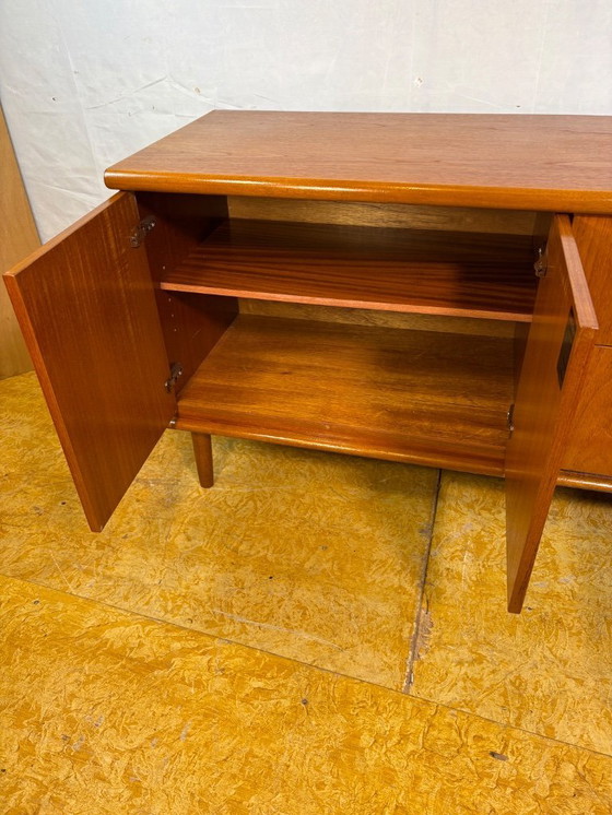 Image 1 of Mid-century retro vintage teak sideboard by Meredew 1960  This elegant teak sideboard by Meredew is a superb example of mid-cent