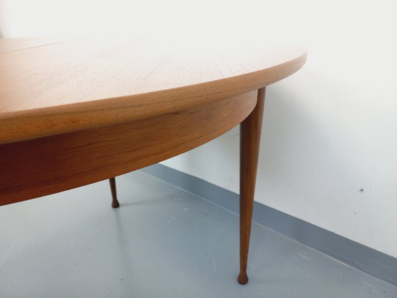 Image 1 of Vintage Scandinavian style round teak dining table from the 1950s/60s with extension