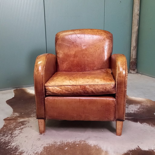 Fauteuil vintage en peau de mouton