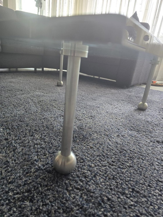 Image 1 of Design glass table with stainless steel legs; square model