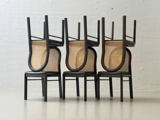 Image 1 of Set van 6 stoelen met rieten en lederen zittingen van Dietiker, jaren 80.