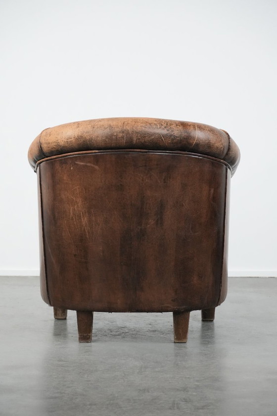 Image 1 of Timeless vintage sheepskin club armchair with character and a beautiful patina