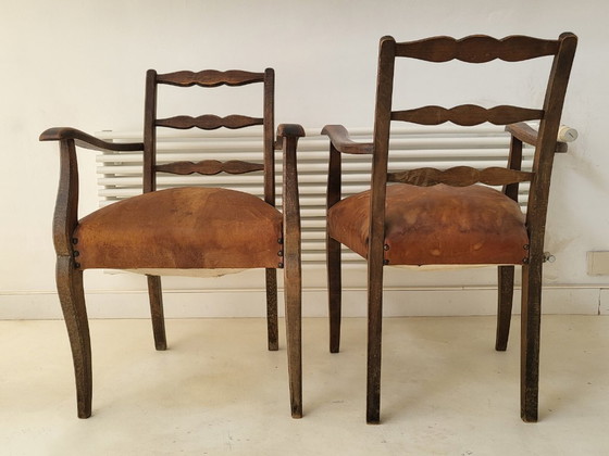 Image 1 of SUPERB PAIR OF VINTAGE ARMCHAIRS FROM THE 1940s AND 1950s IN LEATHER & OAK