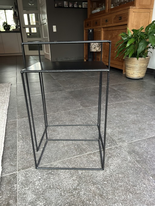 2 black metal side tables